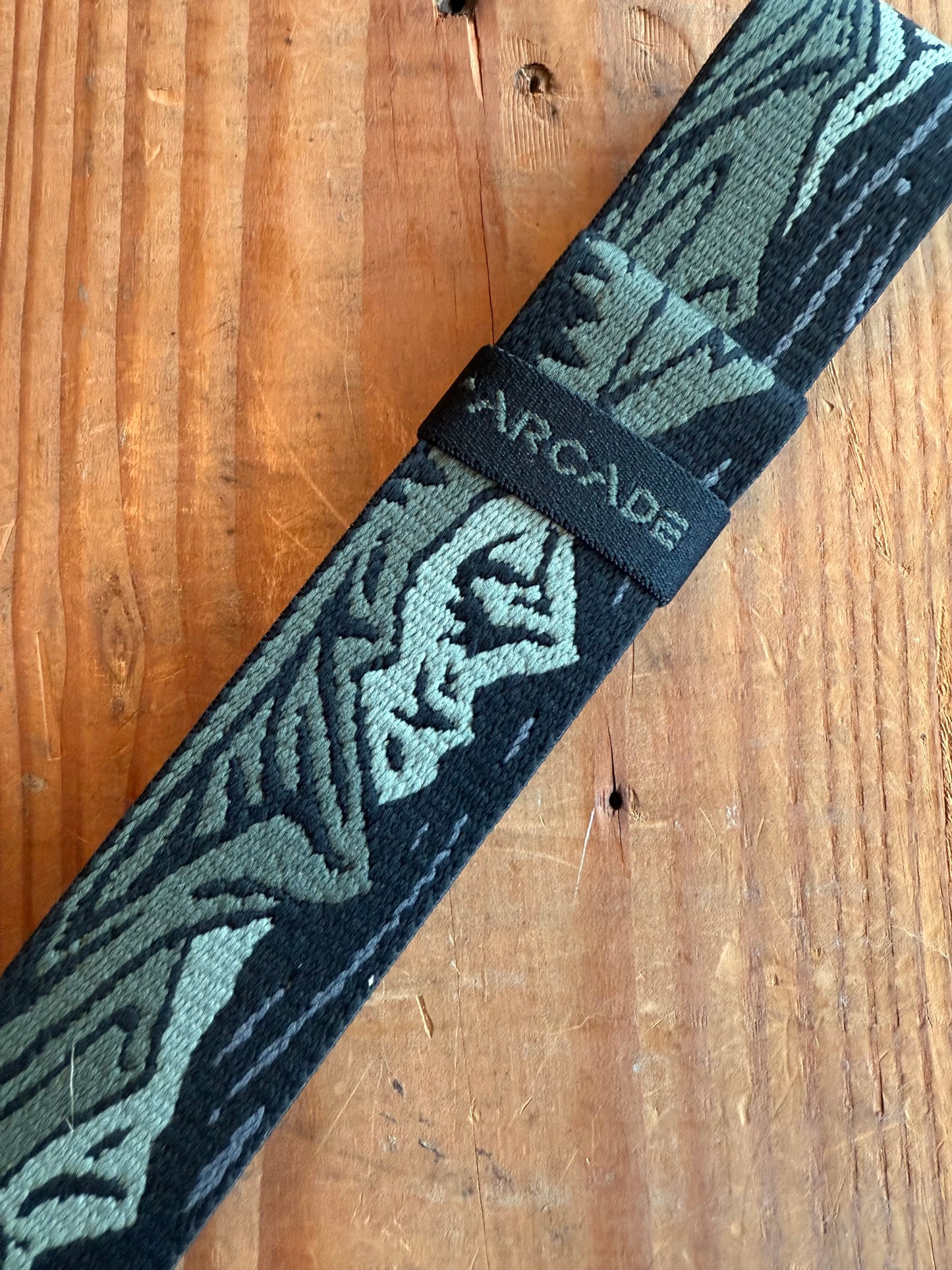 OUT OF RANGE belt